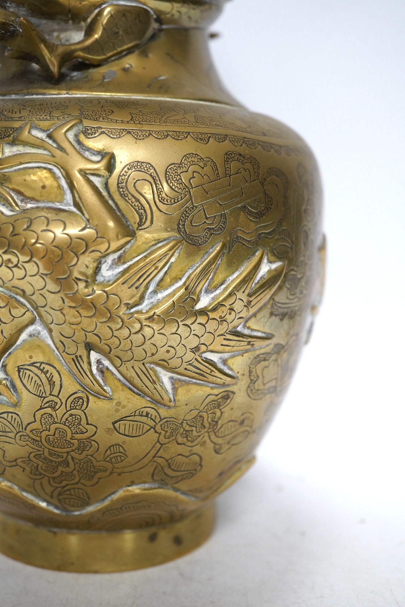 An early 20th century Chinese bronze 'dragon' vase, 25cm. Condition - fair to good